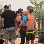 families playing water education games in a library's patio at Carbon Valley Regional Library 